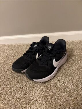 Nike Kids Black Sneakers with White Swoosh